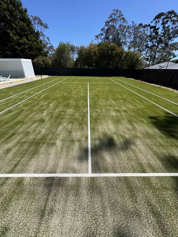 Line-marked synthetic sports lawn