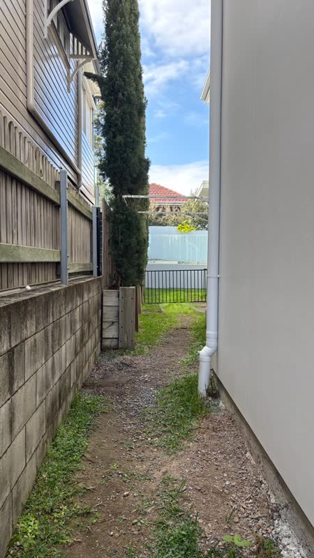 Side passage with bare soil before installation